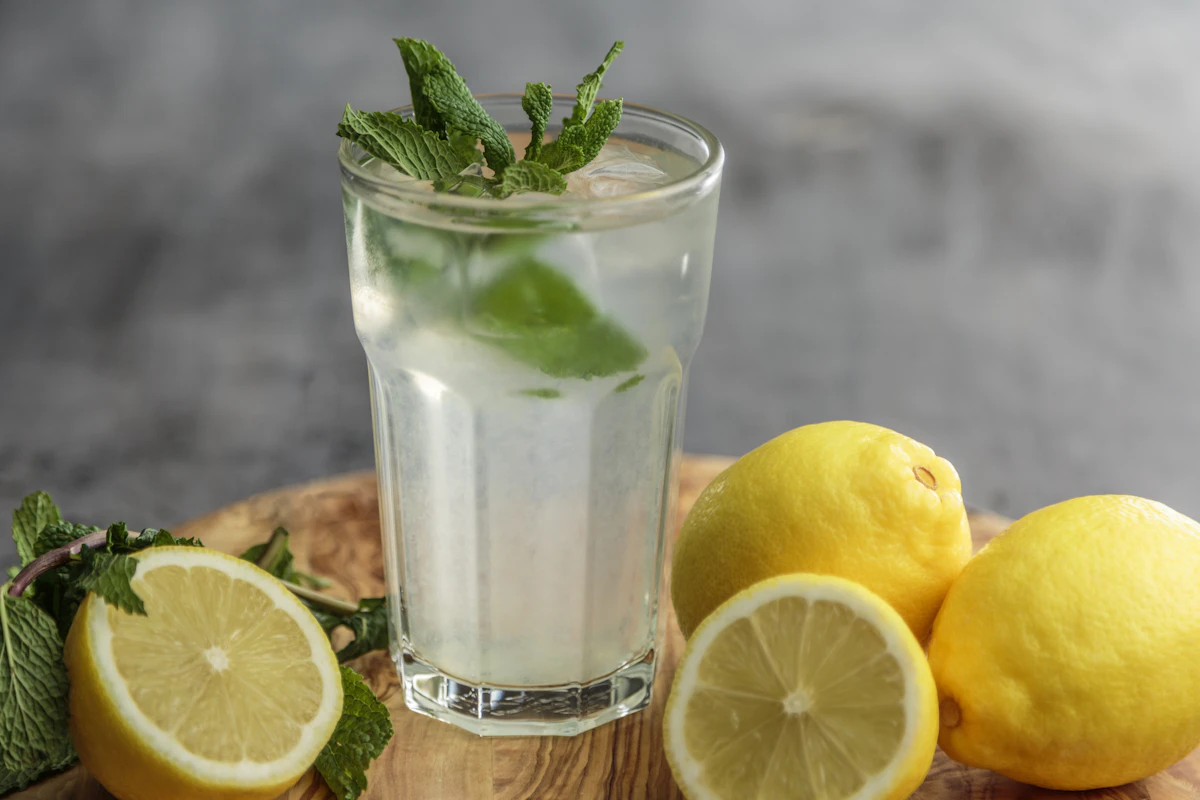 Glass of water with lemon and mint