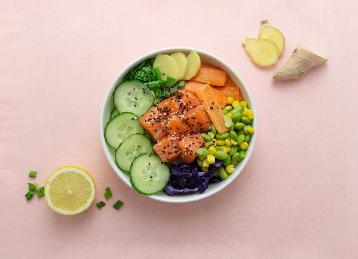 Colorful bowl with salmon, cucumber and edamame