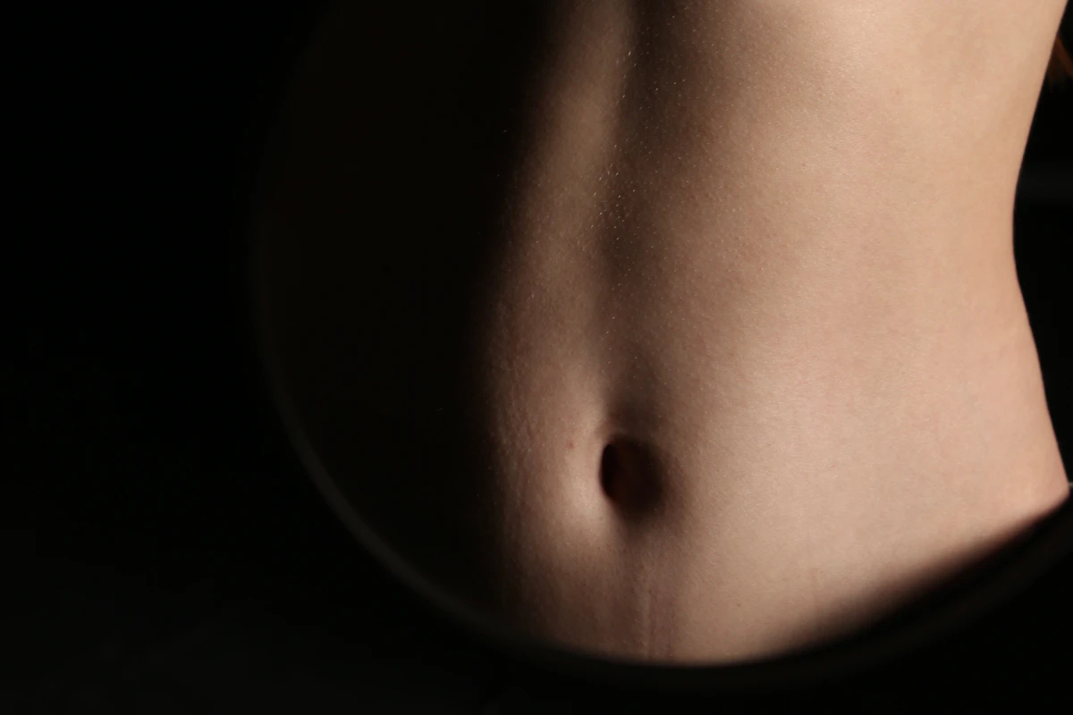 Close-up of a person's abdomen
