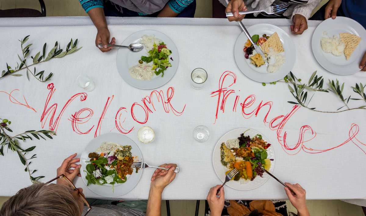 A group of people sharing food around a table