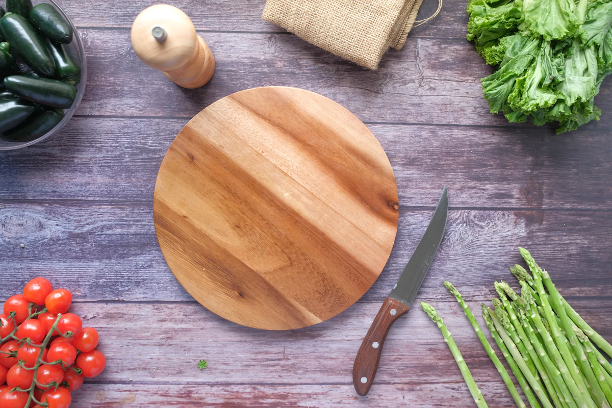 Wooden chopping board with fresh vegetables