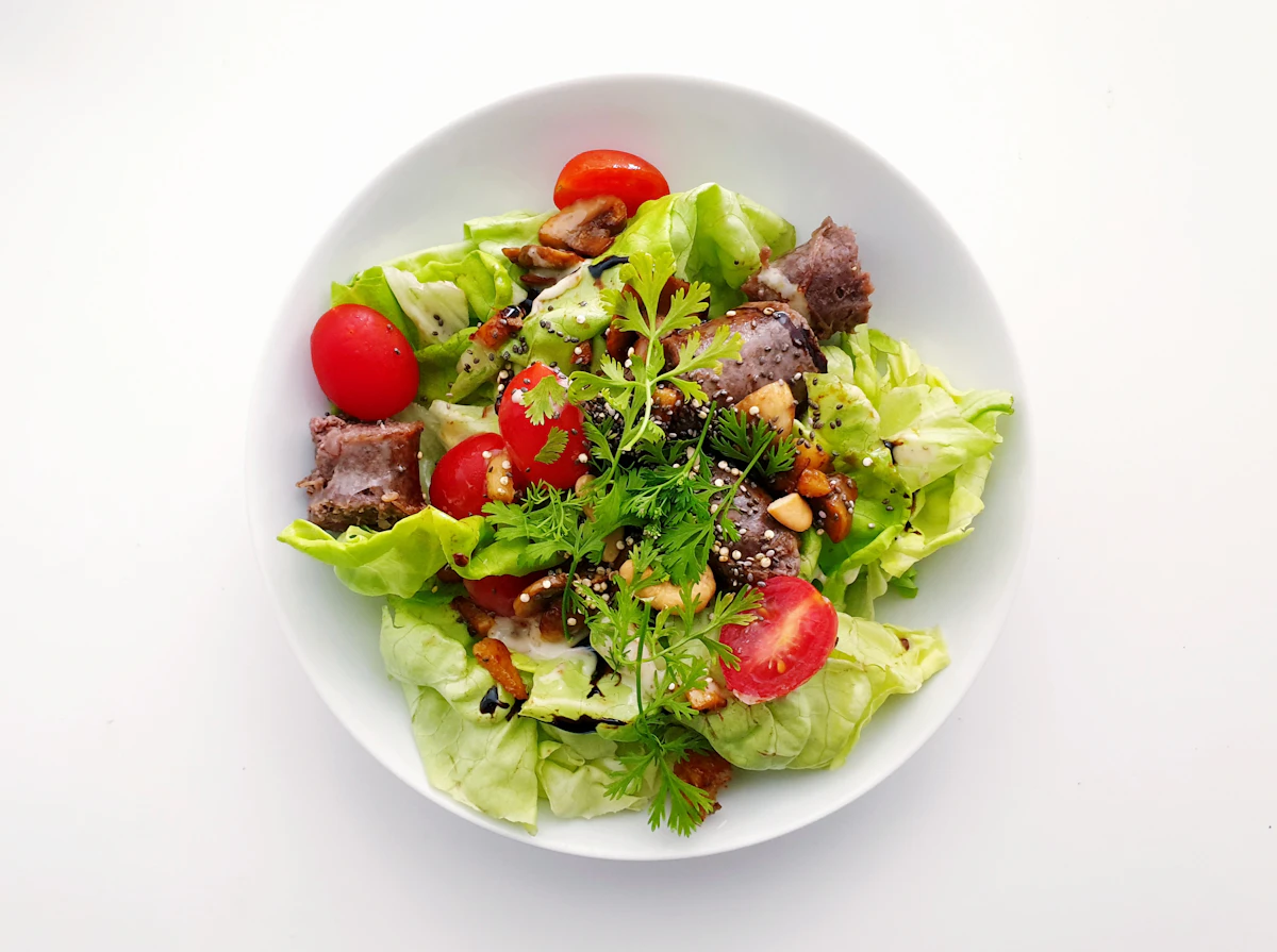 Vegetable salad on a white ceramic plate