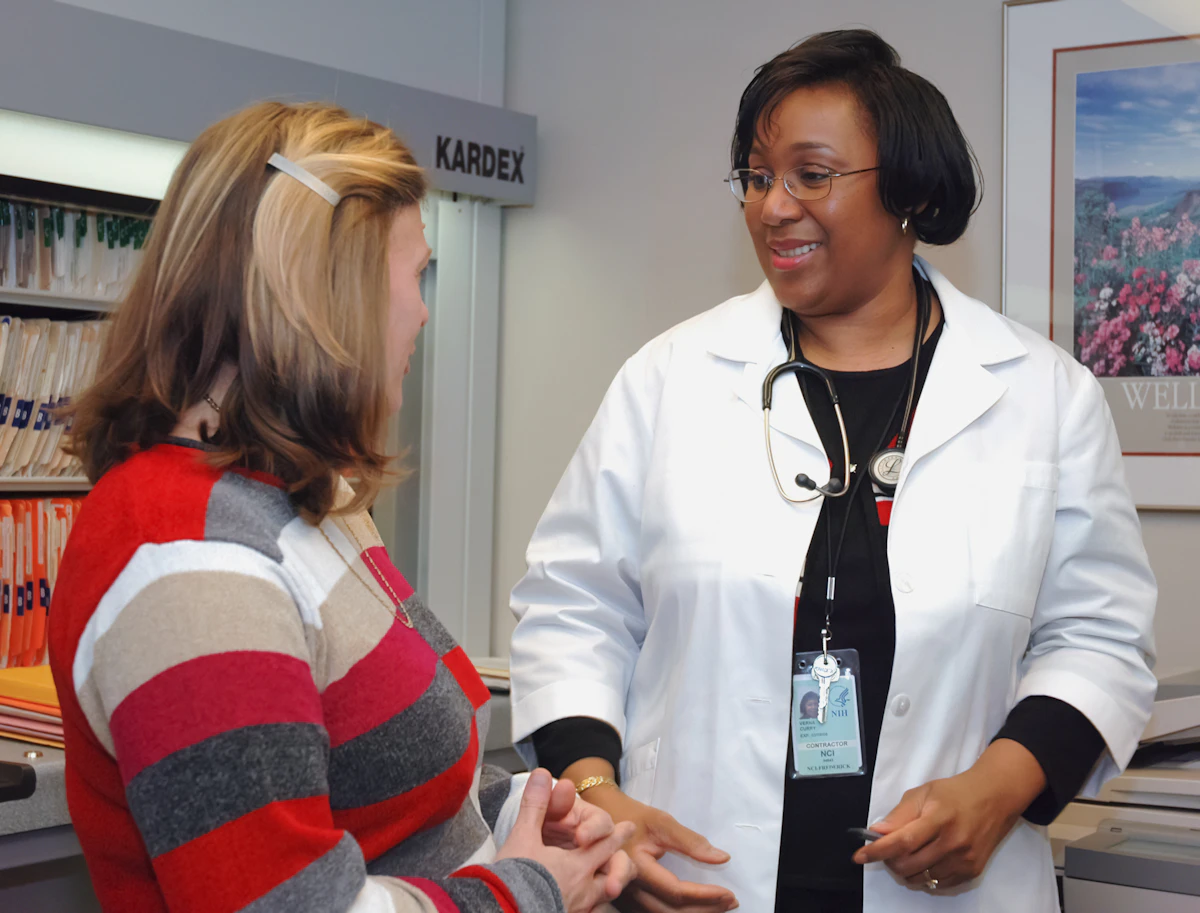 Woman talking with her doctor in a clinic